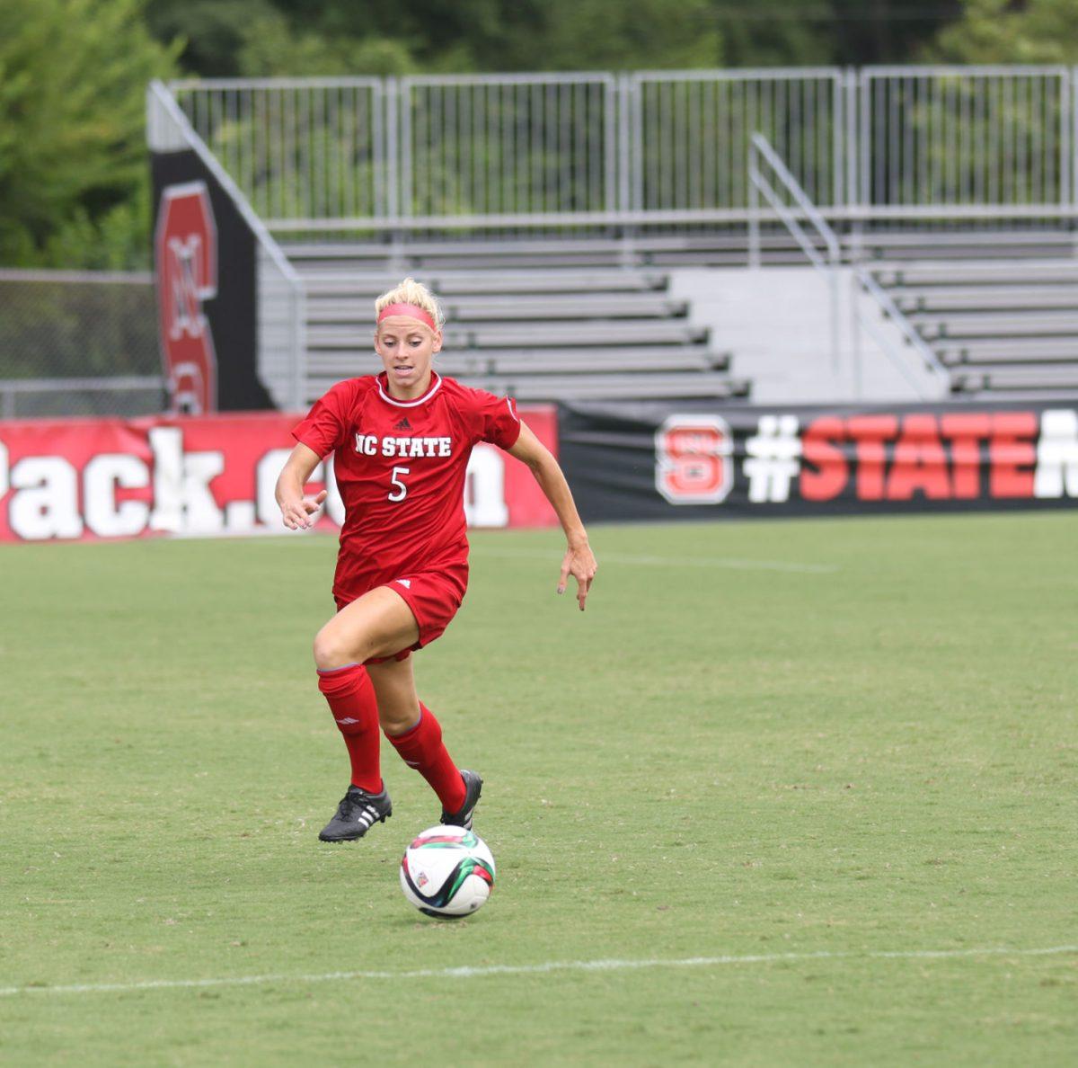 Mackenzie Graybill, sophomore defender, dribbles the ball down the field at the game against William &amp; Mary September 6. The wolfpack lost to the tribe 0-3 at Dail Stadium.