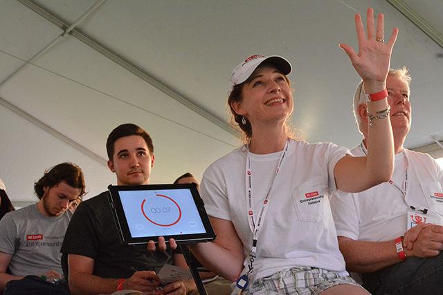 Official time keeper at Minute to Win It Pitch Competition warns the participant about the time remaining for his pitch at Entrepalooza. Entrepalooza is an annual enrepreneurship and innovation festival hosted by the NC State Entrepreneurship Initiative. The event took place at The Oval Thursday on September 3, 2015.