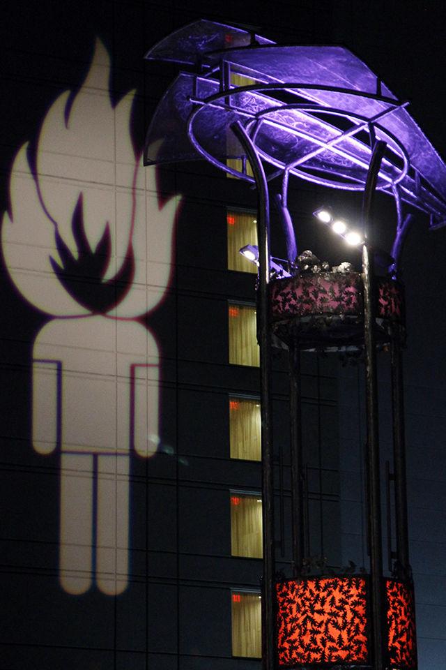 SparkCon mascot being projected on the wall of Marriot Hotel near the Main Stage. SparkCon is an annual four day street art festival of Raleigh which takes place downtown along the Fayetteville street and features aspiring local artists.