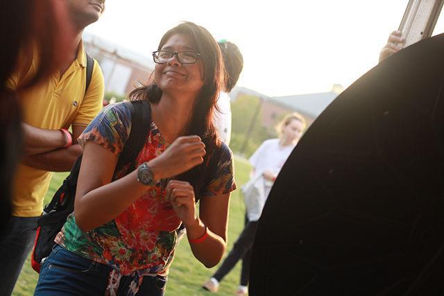 Afsana Chowdhury, a Sophomore majoring in Electrical Engineering responds wearily at the result of a spinning wheel game at the Oval during Entrepalooza, on Thursday, September 3, 2015.