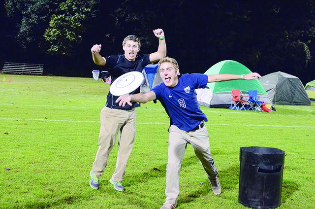 Benjamin Gold, Freshman in Biology, and Sam McMurray, Freshman in Chemical Engineering, play a game of Cam Jam against some friends at the Basketball Campout on Sept. 19 at Miller Field. The intense rivarly games against Duke and UNC inspired them to participate in the campout.
