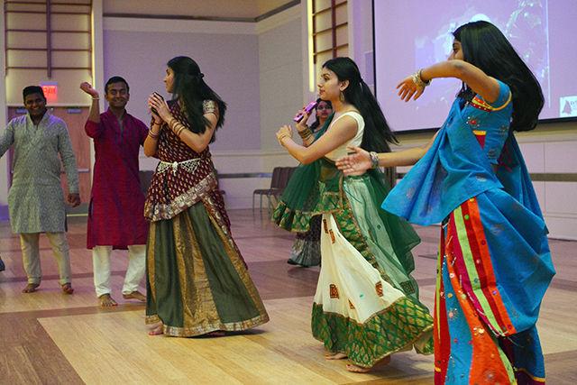 Neelam Modi, a sophomore in biomedical engineering, Karina Patl, a junior in business administration and Puja Patel, a sophomore in biomedical engineering participate in garba dance friday evening, Oct 23rd in the talley ballroom. Garba is a traditional Indian folk dance originating in Gujarat, India. The dance was sponsored by EKTAA of NCSU as part of hindu festival Navaratri (9 nights) and was followed by 'aarti' to the goddess shakti.