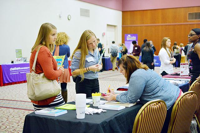 Crystal Gunther, a junior studying chemical engineering at Meredith College, and Alex Brinkley, a junior studying child development at Meredith College, talk with a representative from The Princeton Review at the NC State Graduate School Fair Tuesday. The fair gave students the opportunity to talk with faculty and staff from more than 60 schools about graduate programs, including East Carolina University, Duke University, Elon University and the University of South Carolina. There were also programs for studying abroad and faculty members giving tips on applying to graduate school. "It's kind of overwhelming to look at graduate schools online," Gunther said. "When you go to a fair like this, you can see the programs and talk to the people face to face and engage and ask questions."&#160;