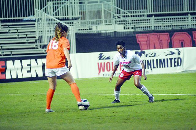 Ella Bonner a freshman defender gards against Virginia player. NC State took on No.1 Virginia on Wednesday evening in Dail Soccer Field with an attendance of 226. The Wolfpack lost 7-1 against Virginia on October 28th.
