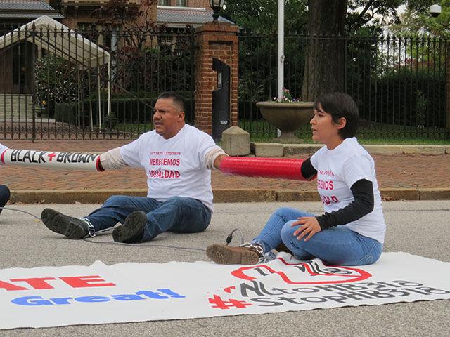 David Salazar and Nayely Perez chained together in front of the Governor&#8217;s Mansion in downtown Raleigh on Thursday.