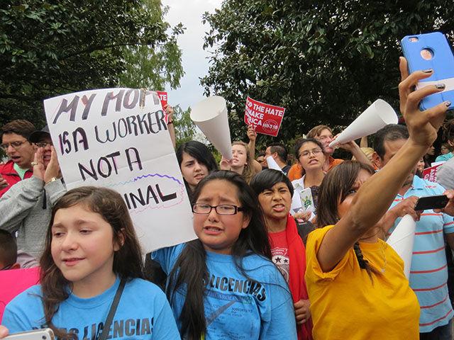 Protestors, young and old, chant in opposition to HB 318 in front of the Governor&#8217;s Mansion on Thursday.