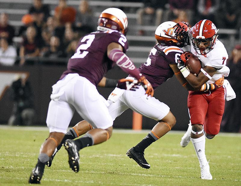 Freshman wide receiver, Nyheim Hines, is tackled by VT cornerback Mook Reynolds Friday, Oct. 9, at Lane Stadium at Virginia Tech. NC State had 157 yards during the game. N.C. State lost to the Hokies 28-13.