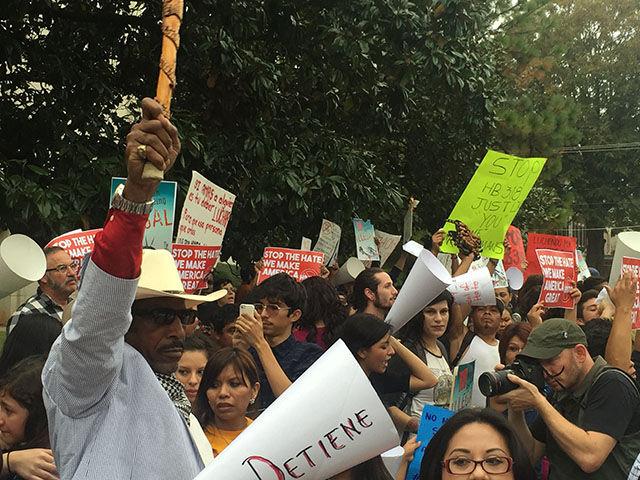Protesters chant in opposition to HB 318 in front of the Governor's Mansion in downtown Raleigh on Thursday.&#160;