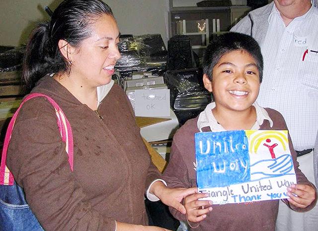 The United Way of the Greater Triangle's Teaming for Technology program has given more than 25,000 refurbished computers to families in need since 2004.