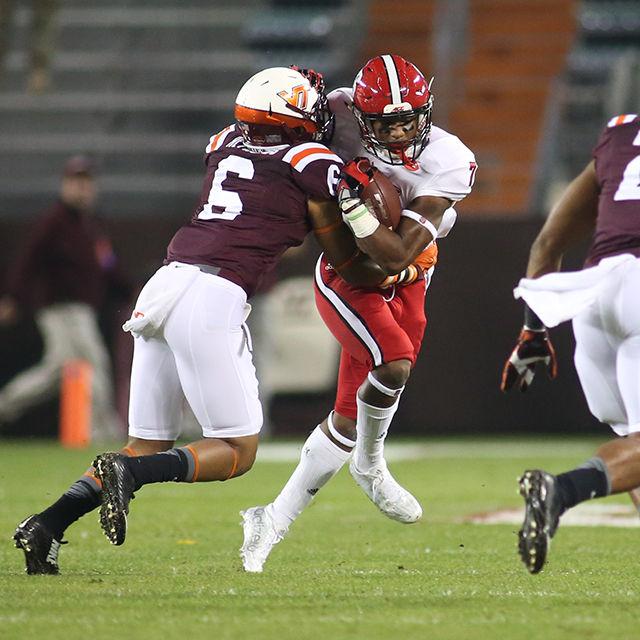 Freshman wide receiver Nyheim Hines carries the ball for extra yardage after the catch against Virginia Tech. Hines had one reception for 17 yards and 2 kick returns for 54 yards. Everything seemed to go wrong for the Wolfpack who lost the game 28-13 to VT on October 9th in Lane Stadium.