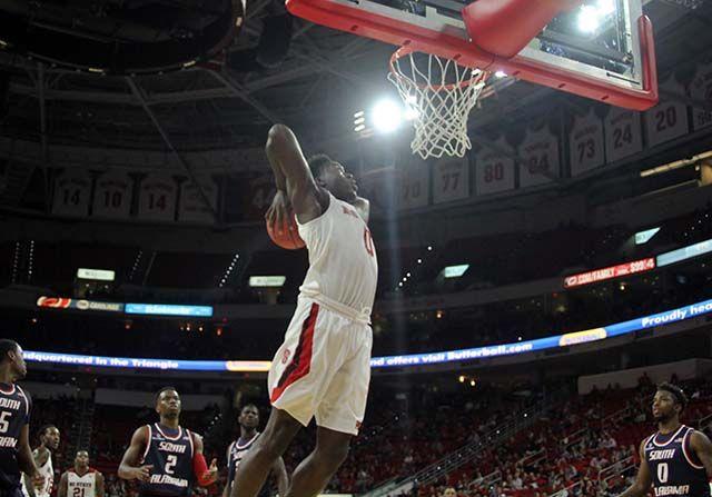Abdul-Malik Abu, sophomore forward prepares to dunk during the men's basketball game at PNC Arena. The wolfpack played the University of South Alabama Sunday, November 15. Abu had 14 points and 6 rebounds. The Wolfpack won the game 88-70.