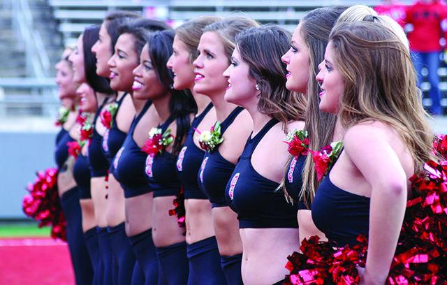 The NC State dance team performs during the pregame festivities at Carter Finley Stadium on November 28. Pregame festivities included a tribute to the senior class. The pack lost the game 45-34
