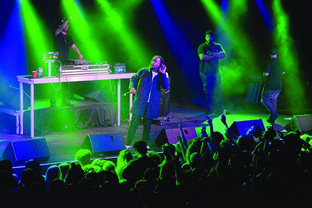 A crowd of NC State students and other fans sing along with rapper Ty Dolla $ign at The Ritz concert venue for the Pack Howl concert hosted by the NC State Union Activities Board on Friday November 6 2015. Maria Arfeen, a senior in Nutrition, got to the venue early with her friends to get a front row spot for the show. She says that she has "been a fan of Ty Dolla $ign since [his song] Paraniod was released."