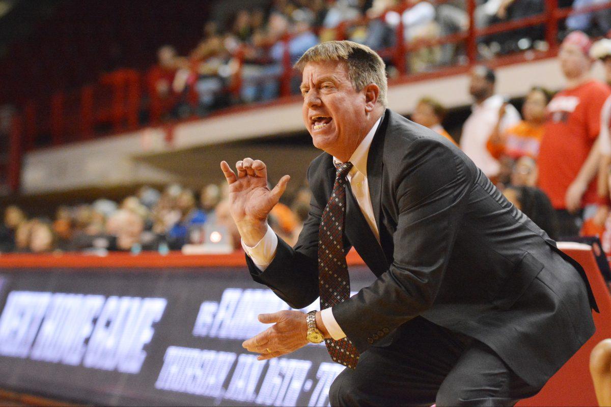 Head coach Wes Moore yells instructions to his team during the conference opener against Syracuse in Reynolds Coliseum Sunday, Jan. 5, 2014. The Wolfpack defeated the Orange 67-61, improving their record to 14-1 on the season. Photo by John Joyner.