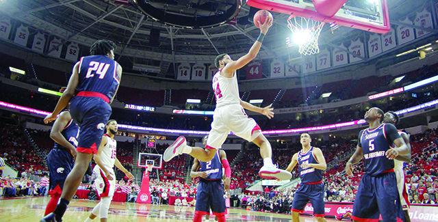Caleb Martin, sophomore forward goes in for a layup during the men's basketball game at PNC Arena. The wolfpack played the University of South Alabama Sunday, November 15. Caleb Martin led the team in scoring with 19 points. The Wolfpack won the game 88-70.