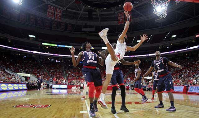 Caleb Martin, sophomore forward gets fouled while going in for a layup during the men's basketball game at PNC Arena. The wolfpack played the University of South Alabama Sunday, November 15. Caleb Martin led the team in minutes played. The Wolfpack won the game 88-70.
