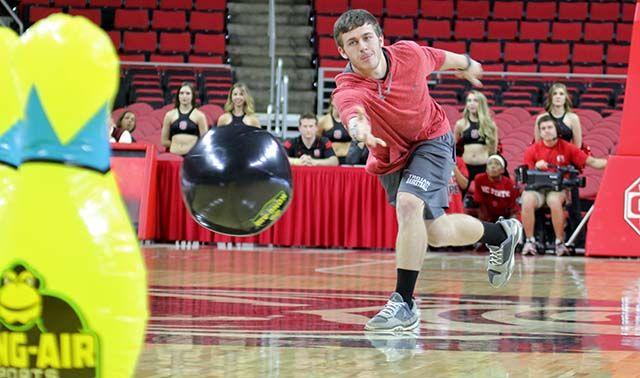 Students play big air bowling during the women's basketball game at PNC Arena. The wolfpack played the Villanova, November 13. Spencer had 11 points and 6 rebounds. The Wolfpack won the game 70-64.