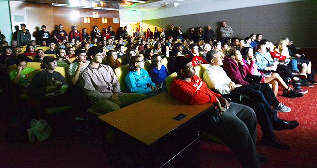 Students view a student made short film in the auditorium of D.H. Hill Library. This was part of the Student Short Film Showcase, held Tuesday, November 3, 2015 at 7 pm.
