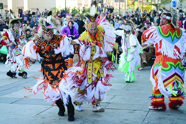 This style of dance is called Pow Wow style dancing. It is shared from tribe to tribe. It is also called the grass dance as it originates where the buffalo grass grows. The feathers on their heads represent the antlers on the grass hoppers in the grass. This dance is part of 20th Annual American Indian Heritage Celebration that took place in downtown Raleigh at the North Carolina Museum of Natural History on Saturday, Nov 21.