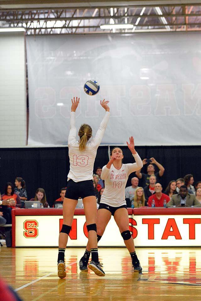 Junior setter Maggie Speaks sets the ball for her teammate Blayke Hranicka. Speaks lead with 42 assists and 13 digs. The Wolfpack won against Virginia Tech 3-0 on November 13th in Charmichael Gym.