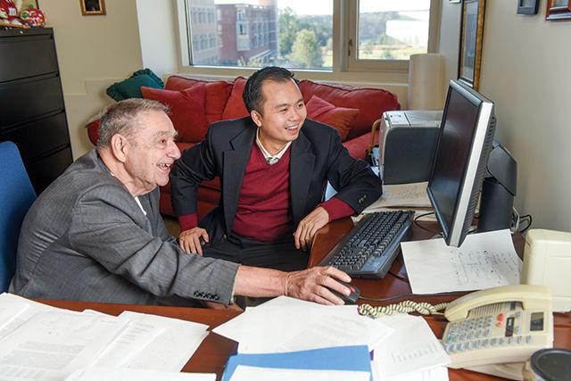After starting college earlier than most and finishing with a Ph.D. in biomedical engineering at NC State, alumnus Scott Vu (right) is now co-founder and CEO of RiboWiz Scientific. Here, Vu sits with his former professor, inspiration, mentor and friend Donald Bitzer, a distinguished research professor at NC State.&#160;