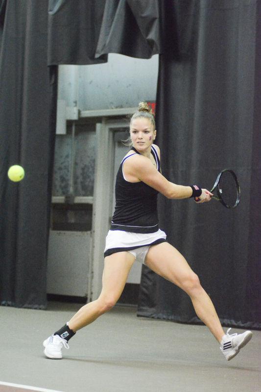 Junior Martina Frantova readies a backhand. Frantova won in 2 sets, 6-3, 6-1, helping State to an overall victory of 4-2 against East Carolina University on Mon., Januay 25th, 2016 at J.W. Isenhour Tennis Center.
