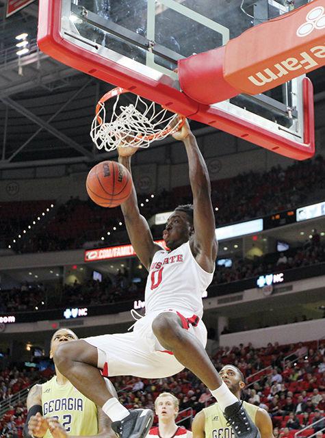 Sophomore forward Abdul-Malik Abu dunks during the Wolfpack's 90-83 loss to the Georgia Tech Yellow Jackets Wednesday at PNC Arena. Abu scored a career-high 22 points and grabbed 11 rebounds in the Pack's loss.&#160;