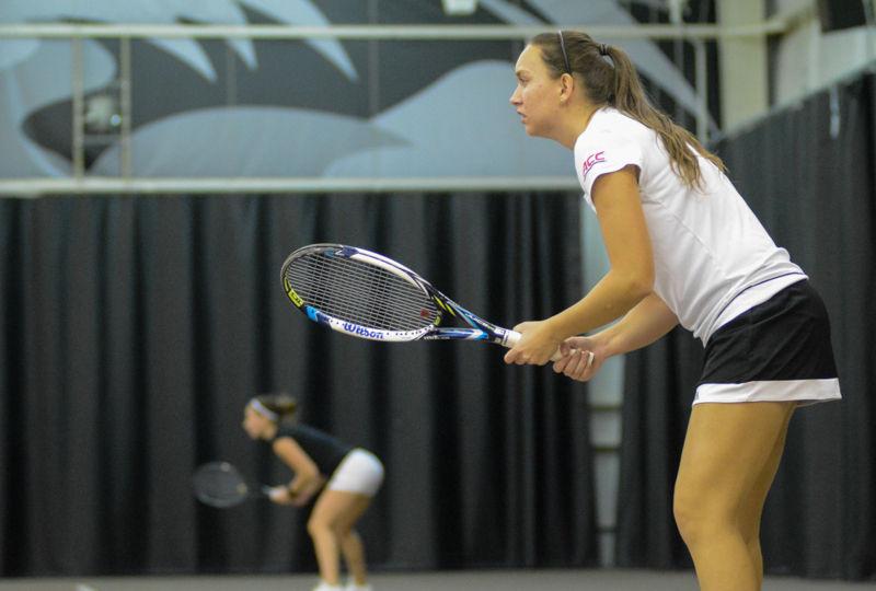 Senior Joanna Nalborska waits for the tennis ball to be served to her. Nalborska lost 3-6, 6-2, 6-4 against Virginia Commonwealth University at J.W. Isenhour Tennis Center on Sat., January 30th, 2016.