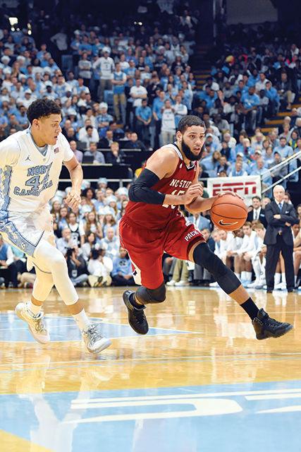 Sophomore Guard, Cody Martin, drives to the lane past a defender on January 16th in the Dean Dome. Martin shot 57 percent from the field and scored 10 points. The Wolfpack suffered a 67-55 loss marking there 5th consecutive conference lost.