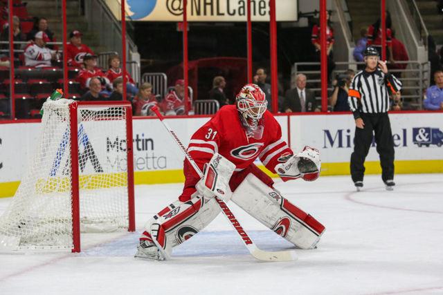 Hurricanes goalkeeper Eddie Lack prepares for the oncoming pursuit of the Florida Panthers' offense. The Panthers beat the Canes 2-0 Dec. 18.