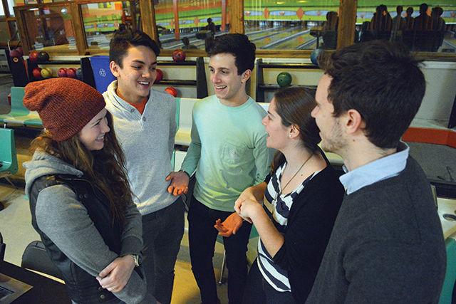 Shannon Robbins and Caleb Ocampo, sophomores in engineering, Alberto Berrizbeitia, sophomore in International studies, Anne Carrol, a junior in political science, and David Lovato, a sophomore in chemical engineering hang out and get to know each other at the fellowship event held by Alpha Phi Omega as part of their spring rush at the alley on Monday, January 25th. 'It's so fun meeting all the new potential pledges!' said Caleb. 'Simply great seeing so many people interested in providing service and making friends with others from all sorts of backgrounds' said Alberto.