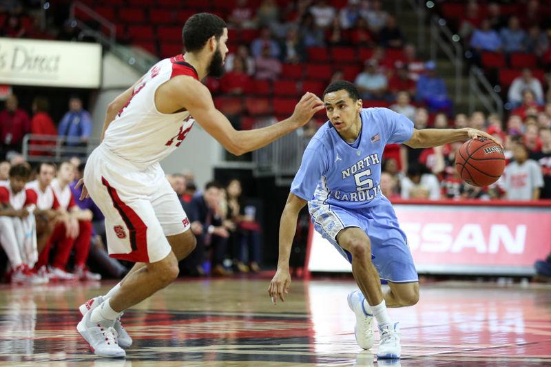Sophomore guard/forward Caleb Martin guards UNC Guard Marcus Paige while he drives to the hoop in the second half. Caleb Martin finished the game with 11 points, six rebounds, one assist, and one turnover in 25 minutes. The NC State Wolfpack lost to the UNC tarheels, 80-68, at PNC Arena on February 24, 2016.
