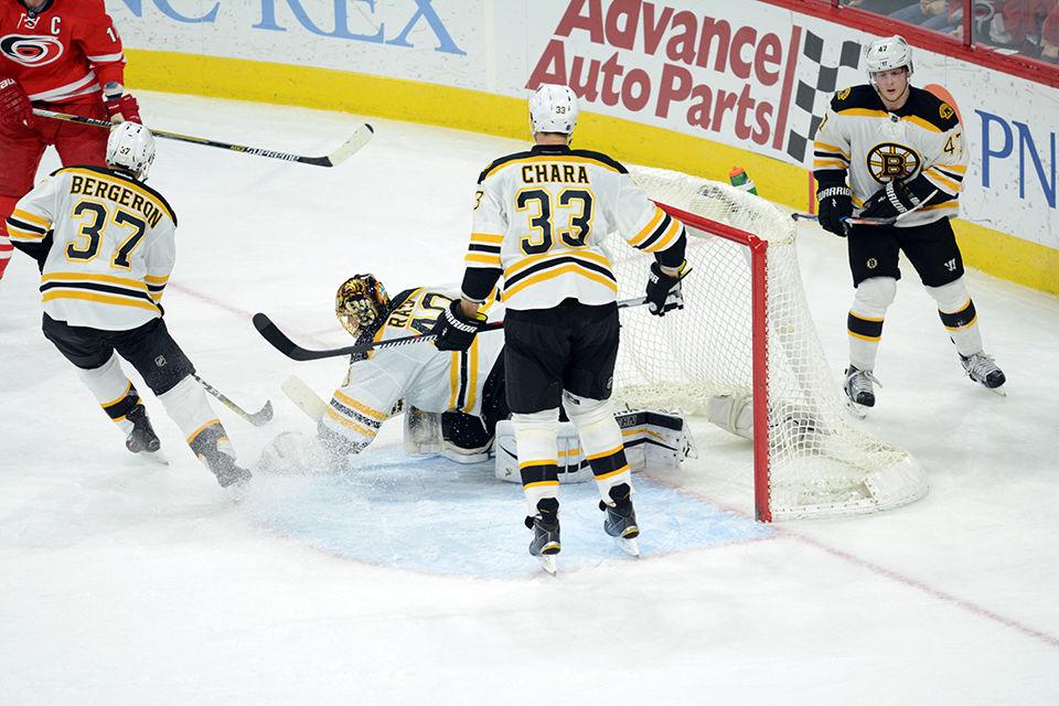 Boston Bruins goalie Tuukka Rask grabs the puck after an attempted shot by the Carolina Hurricanes during the second period of the game on Friday, Feb 26, 2016.