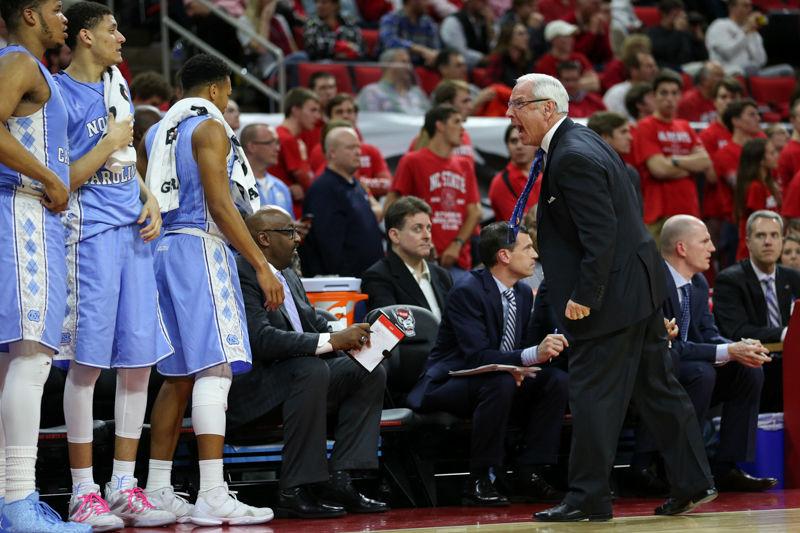 UNC Coach Roy Williams cusses and yells at the UNC bench after a UNC player fails to get back on defense in time in the second half. The NC State Wolfpack lost to the UNC tarheels, 80-68, at PNC Arena on February 24, 2016.