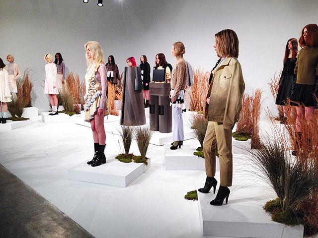 This is a presentation of &#214;HLIN/D, where models stand as though they are in an exhibit. New York Fashion Week attendees observed the new looks that this brand has planned for the upcoming season. The fashion week took place from Feb. 11 to Feb. 18 in New York City.