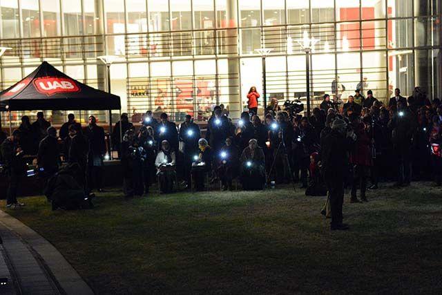 The families of Deah, Yusor, and Razan sit to one side of the stage during the memorial in honor of the three. The memorial was held on Stafford Commons in front of Talley Student Union the night of Wednesday, Feb 10, 2016.