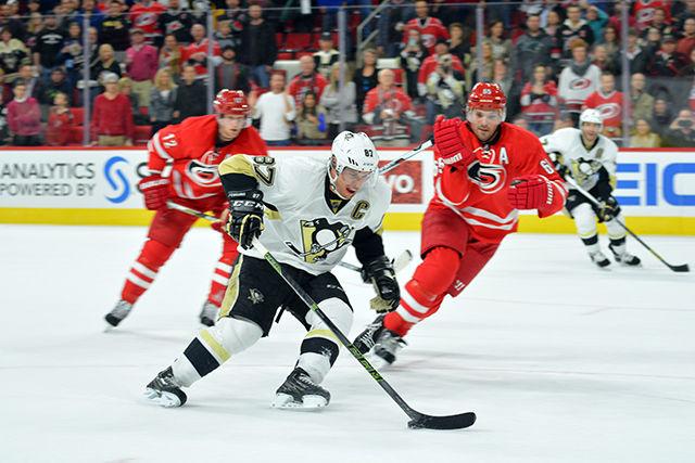 Center forward Sidney Crosby, Captain of the Pittsburgh Penguins, takes control of the puck from the Carolina Hurricanes during the game on Friday, Feb 12, 2016. The Carolina Hurricanes lost to the Penguins 2-1.