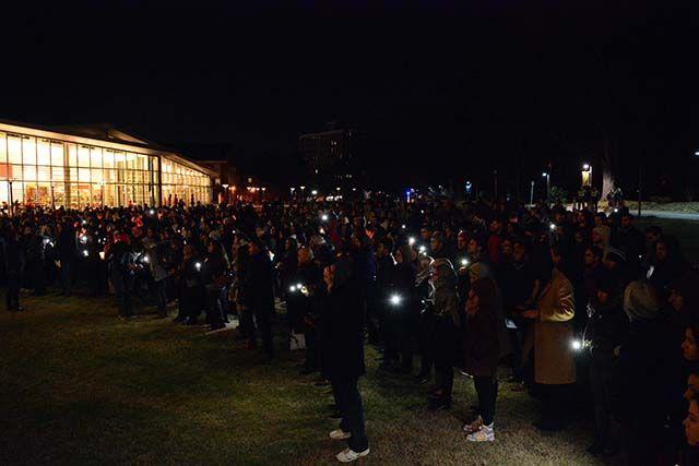When the crowd realized that the candles were being blown out by the wind several began to use their phones in leiu of the candles. The memorial to honor Our Three Winners was held Wedneday night, Feb 10, 2016 on the one year anniversary of the killing of Deah, Yusor, and Razan.