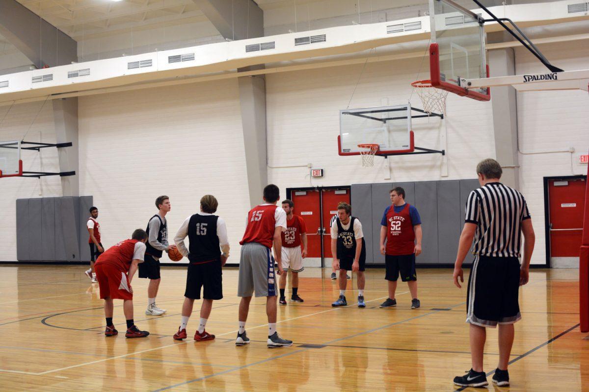 "Intramural Men's Basketball is in full swing at Carmichael Gym on February 29, 2016. Eric Hilse, a Sophomore in Exploratory Studies takes a free throw for the away team, the Jimmy's. In this match they'll be faceing down the home team, Beauty Behind the Basket. Basketball is amongst one of the many Intramural Sports that students at NC State can participate in while on campus. Among them include your typical sports such as 11-on-11 soccer, flag football, and volleyball. The recreation center also host specialty&#160;sports such as bubble soccer, water battleship, and a 3-on-3 basketball tournament."