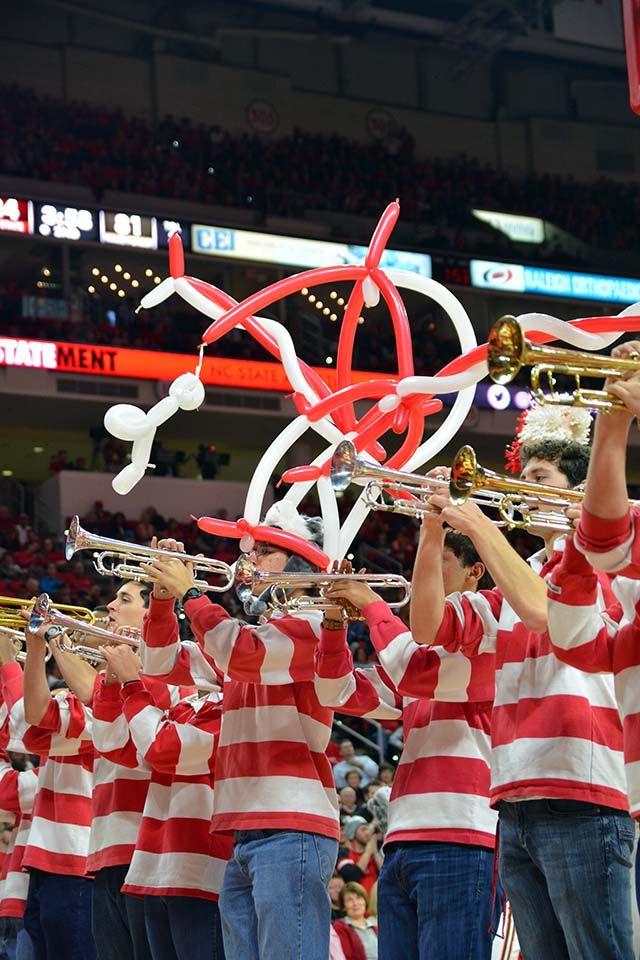 Members of the NC State pep band play quickly during a time out in the second half of the NC State basketball game versus Wake Forest on Saturday, Feb 13, 2016.