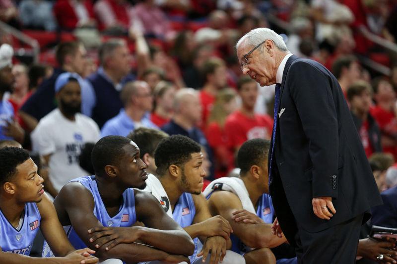 UNC basketball coach Roy Williams yells at UNC players during the game against NC State on February 24, 2016 at PNC Arena.