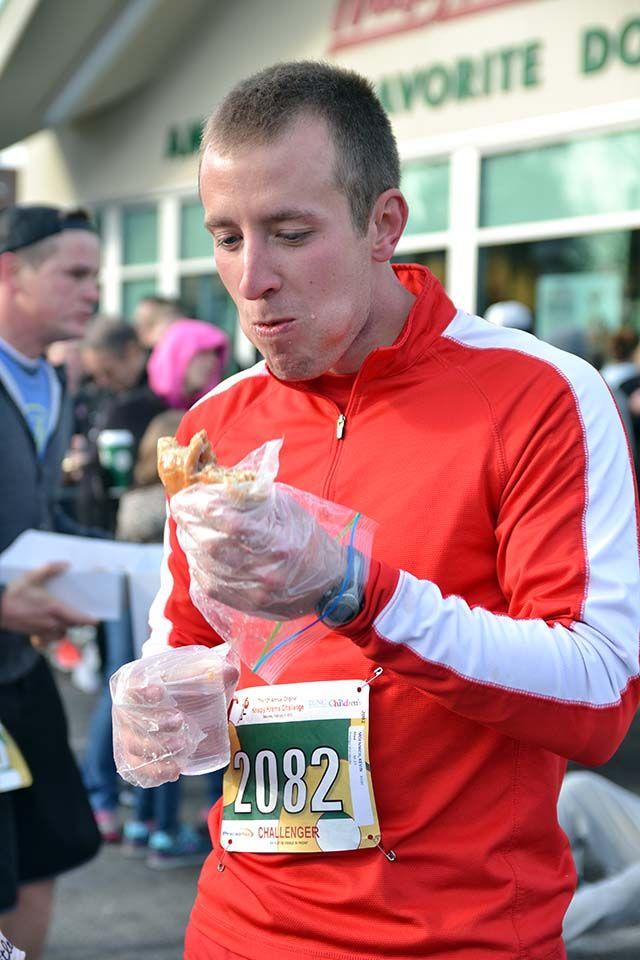 Kevin Moennich, a health and exercise studies professor at NCSU, competes in the 12th Annual Krispy Kreme Challenge on Saturday, Feb. 6th, 2016.