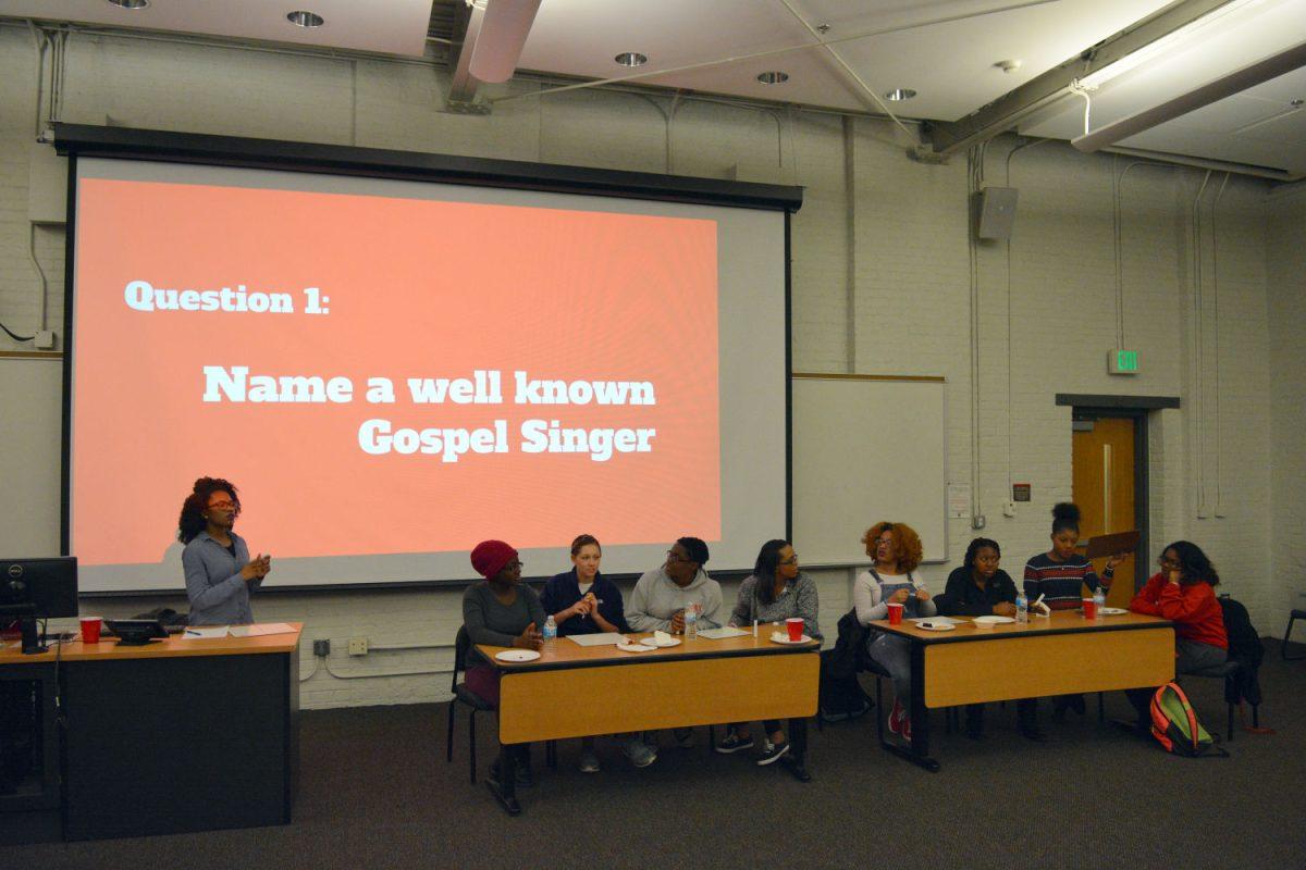 Survey Square-Off In an event hosted by the Multicultural Young Educators Network and the W. E. B. DuBois Honor Society, participants faced off in a family feud style game show event. Before the event students from across the university were sent a survey about black history and asked to fill it out, and the results of the survey were used to create the questions for the event. Teams were then asked these questions with points being awarded based on how many surveyed answered with that answer. The game show portion of the program was led by Shealynn Womble, a senior studying Middle Grades Education. The first team was composed of Chantal Worfied, a freshman studying Middle Grades Education, Mackenzie Nesbit, a freshman studying Sociology, Andrykah Smith, a freshman studying Psychology, and Elaine Moore, a freshman studying Elementary Education. The second team was composed of Erin Figgins, a junior studying Human Biology, Danita Gibbs, a junior studying Criminology, Bailey Franklin, a junior studying Animal Science, and Tyra Barnes, a junior studying Design Studies.