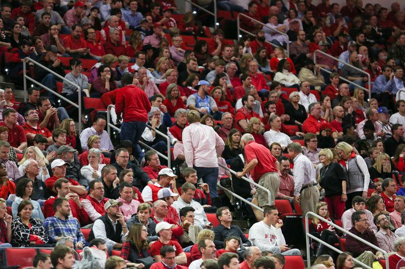 NC State Fans get up and start to leave with 5 minutes left in the game. The NC State Wolfpack lost to the UNC tarheels, 80-68, at PNC Arena on February 24, 2016.