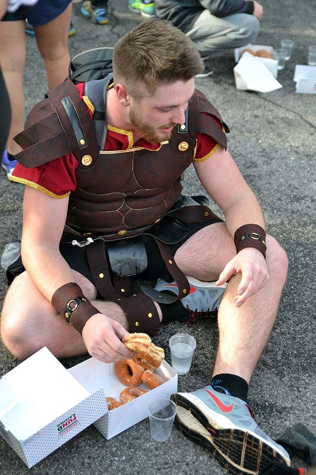 Peter Benson, a junior studying mechanical engineering, eats his dozen doughnuts during his 3rd Krispy Kreme Challenge on Saturday, Feb. 6th, 2016.