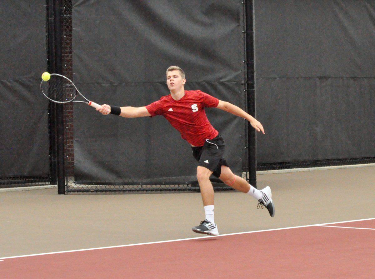 Junior Thomas Weigel returns a serve from Virginia Tech senior Florian Nicoud. Weigel defeated Virginia Tech's Nicoud 6-3, 6-2. The Wolfpack lost the match 4-3 to the 16th-ranked Hokies at J. W. Isenhour Tennis Center on March 22, 2015.&#160;