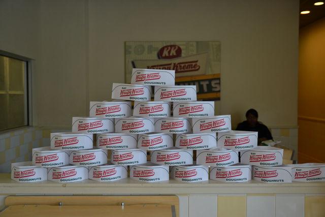 The Krispy Kreme Doughnuts hats sit available to take inside the stores and on tables.