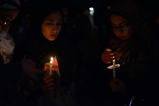 Sarah Salama and Nora Salama attend the memorial and vigil for Our Three Winners on Feb 10, 2016 on Stafford Commons.