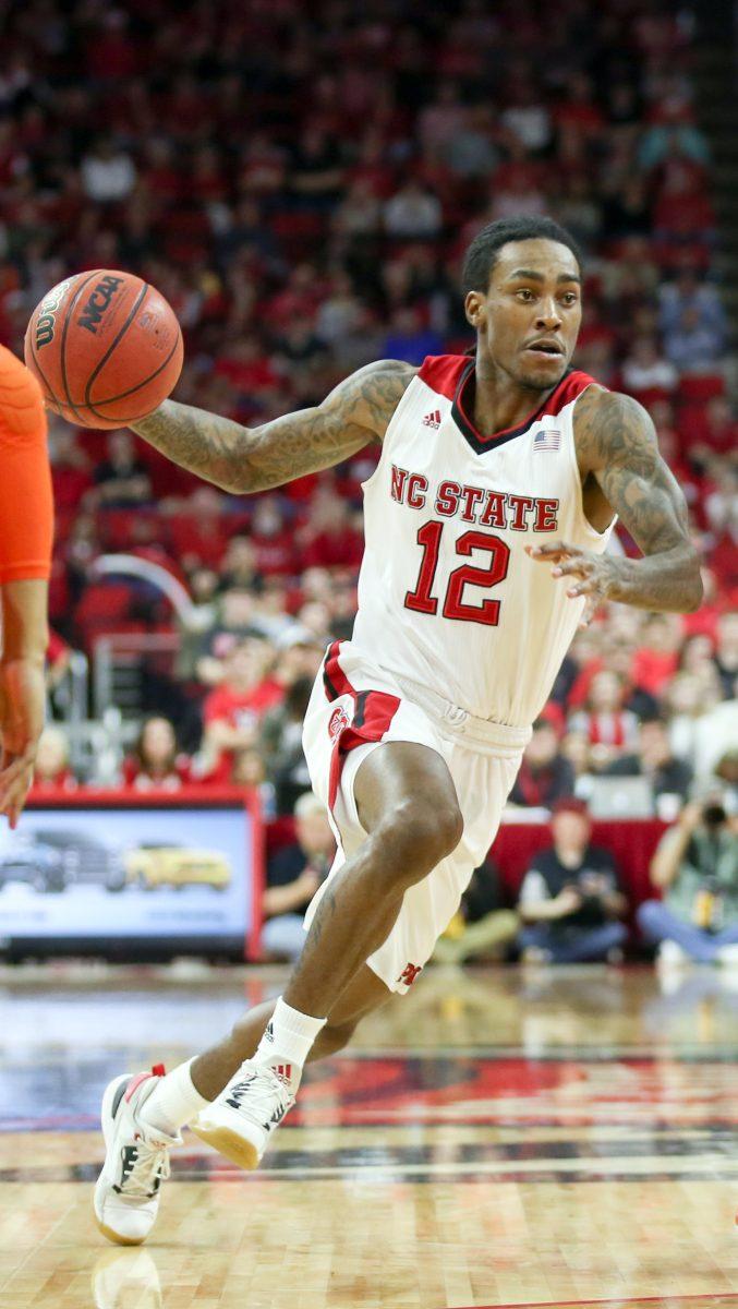 Junior guard Cat Barber drives towards the basket for a tough layup in the first half of the game versus Clemson. Barber finished with eight points on 1-of-12 shooting, including five assists and three rebounds. The NC State Wolfpack beat the Clemson Tigers in a close one, 77-74, at PNC Arena on Feb. 20.