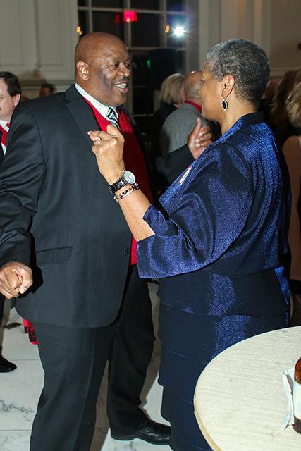 Charles and Doris Bates show off their dance moves at the State Mates event at the Park Alumni Center on February 13, 2016. Mr. and Mrs. Bates who graduated both graduated in 1987 met outside of Welch Hall after Doris asked for directions to Berry Hall. Charles then climbed out of his dorm window to talk to her and said she had the most beautiful eyes he had ever seen.